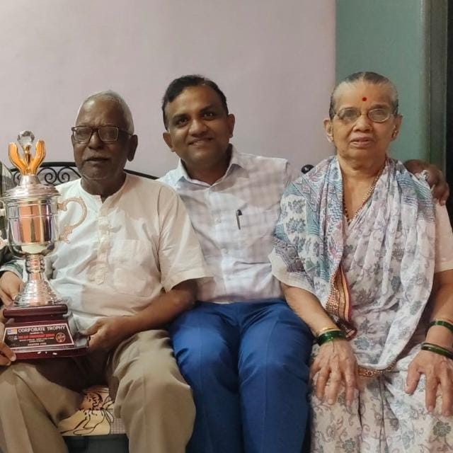 Honored With Family For Corporate Trophy